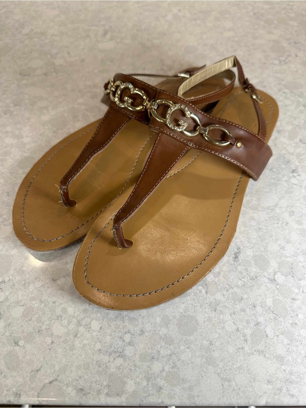 Guess Brown Leather T-Strap Sandals with Gold Chain Accent